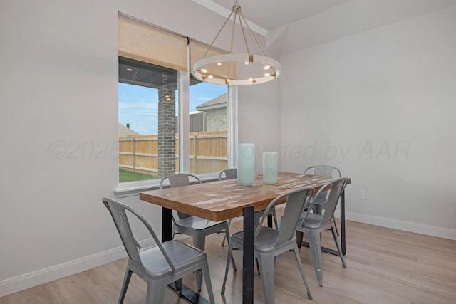 8100 Pensacola Ave, Amarillo, TX 79118 - dining room featuring a chandelier and light wood-style flooring