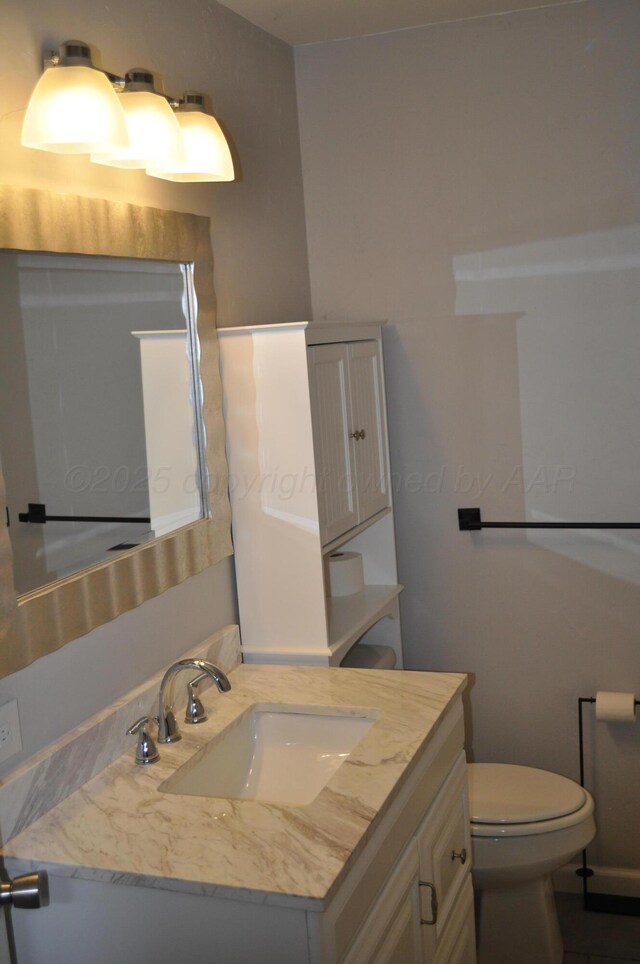 3411 Royal Rd, Amarillo, TX 79109 - half bathroom featuring toilet and vanity