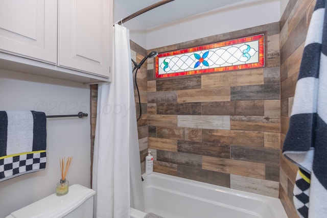 bathroom with toilet and shower / bath combination with curtain