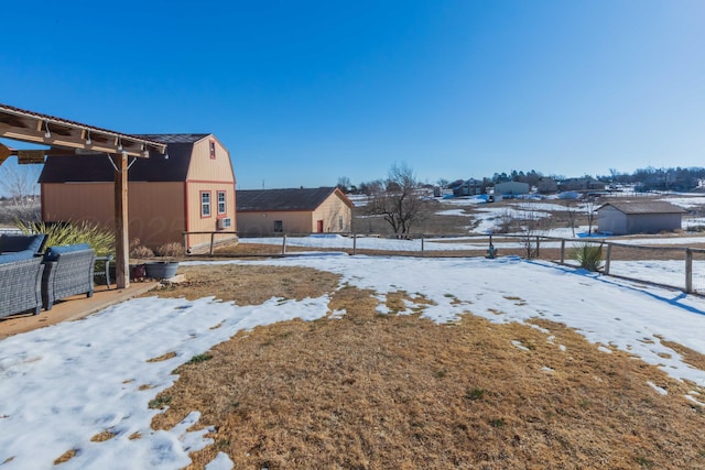 view of yard covered in snow