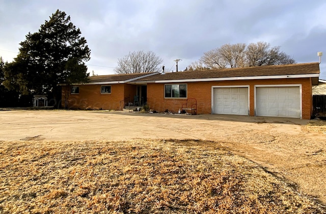 single story home featuring a garage