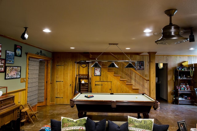 game room with wood walls, billiards, and crown molding