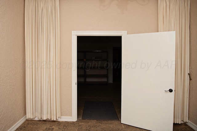 411 E 6th St, Hereford, TX 79045 - hall featuring baseboards
