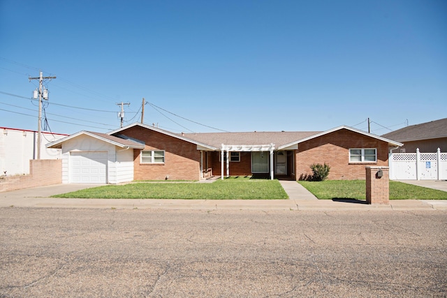 411 E 6th St, Hereford, TX 79045 - ranch-style home featuring a garage, brick siding, and concrete driveway