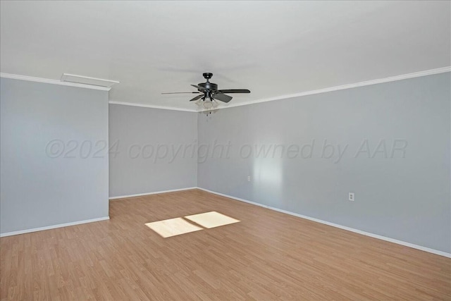 empty room featuring ceiling fan, light hardwood / wood-style floors, and ornamental molding