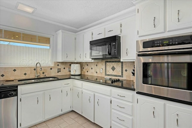 kitchen with backsplash, black appliances, sink, a textured ceiling, and white cabinetry