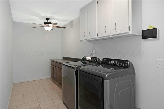 washroom featuring cabinets, light tile patterned floors, washing machine and dryer, and ceiling fan