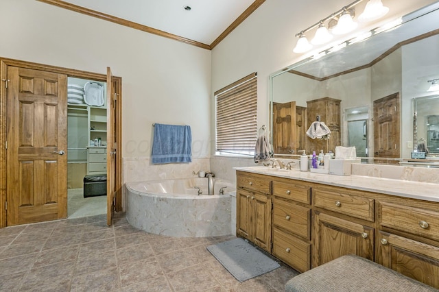 7 Pebble Beach Ct, Amarillo, TX 79124 - bathroom featuring ornamental molding, a garden tub, double vanity, a stall shower, and tile patterned flooring