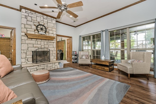 7 Pebble Beach Ct, Amarillo, TX 79124 - living room featuring crown molding, wood finished floors, a stone fireplace, a ceiling fan, and recessed lighting