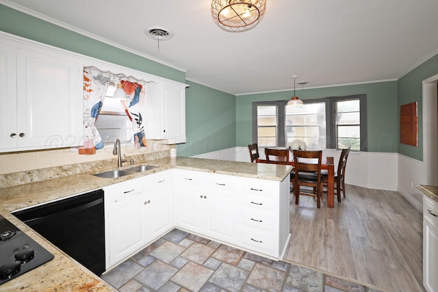 6006 Elmhurst Rd, Amarillo, TX 79106 - kitchen featuring a sink, crown molding, black appliances, white cabinets, and light stone counters