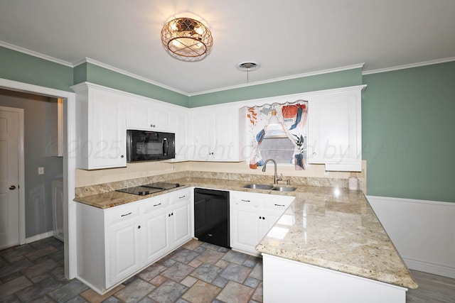 6006 Elmhurst Rd, Amarillo, TX 79106 - kitchen featuring black appliances, a sink, white cabinetry, crown molding, and light stone finish flooring