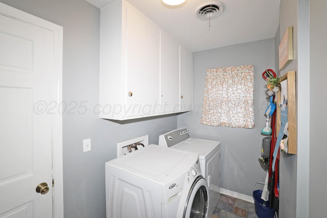 6006 Elmhurst Rd, Amarillo, TX 79106 - washroom featuring cabinet space, separate washer and dryer, and baseboards
