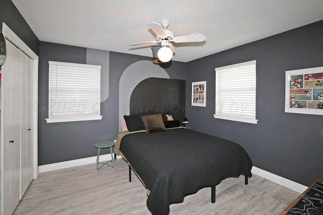 6006 Elmhurst Rd, Amarillo, TX 79106 - bedroom with wood finished floors, baseboards, a closet, and ceiling fan