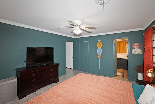 6006 Elmhurst Rd, Amarillo, TX 79106 - bedroom with ornamental molding, wood finished floors, a ceiling fan, and connected bathroom