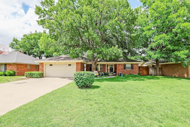 6006 Elmhurst Rd, Amarillo, TX 79106 - ranch-style house with brick siding, an attached garage, and concrete driveway