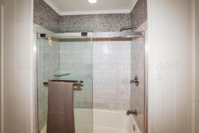 620 N Main St, Stratford, TX 79084 - bathroom with ornamental molding and shower / bath combination with glass door