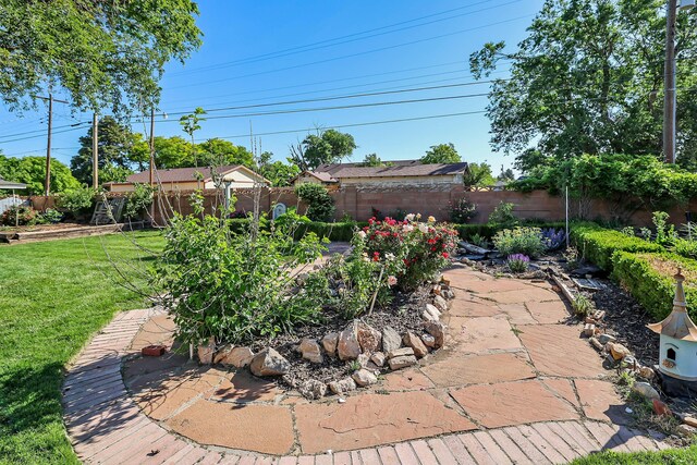 620 N Main St, Stratford, TX 79084 - view of patio with a garden