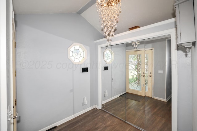 620 N Main St, Stratford, TX 79084 - entryway with vaulted ceiling, a chandelier, dark wood-style floors, and baseboards