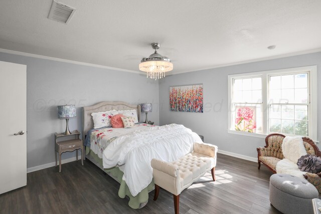 620 N Main St, Stratford, TX 79084 - bedroom featuring crown molding, baseboards, and wood finished floors