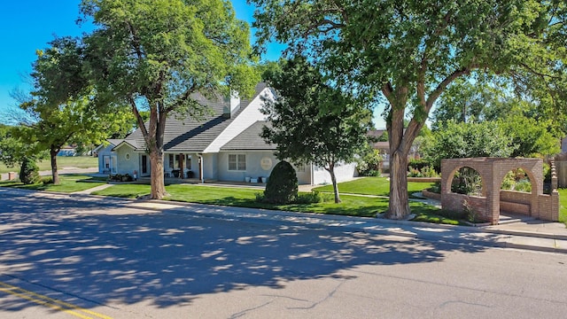 620 N Main St, Stratford, TX 79084 - view of front of property featuring a front yard and stucco siding