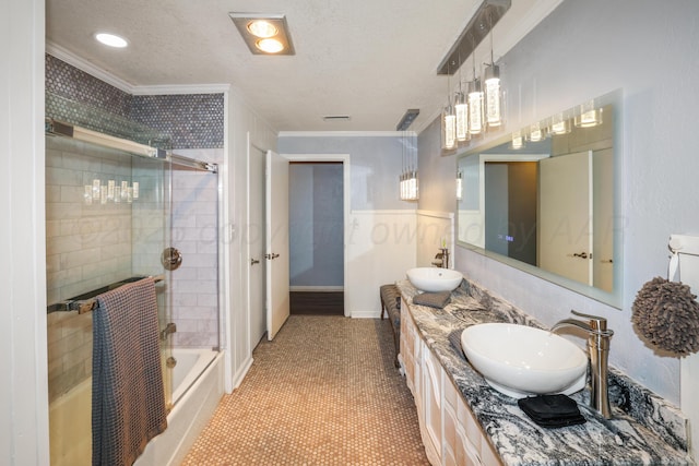 620 N Main St, Stratford, TX 79084 - bathroom with ornamental molding, double vanity, a textured ceiling, shower / tub combination, and tile patterned floors