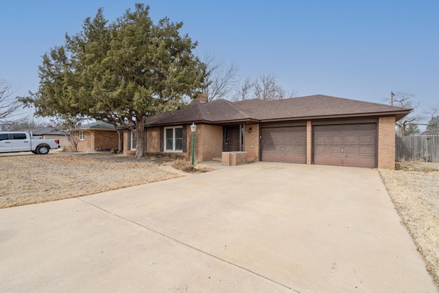 ranch-style home with a garage