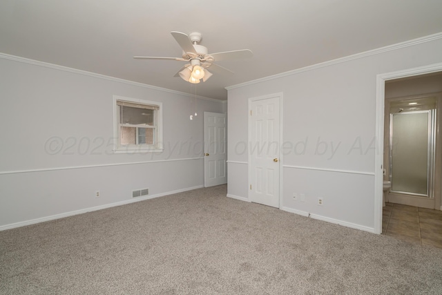 unfurnished bedroom with crown molding, ceiling fan, and carpet