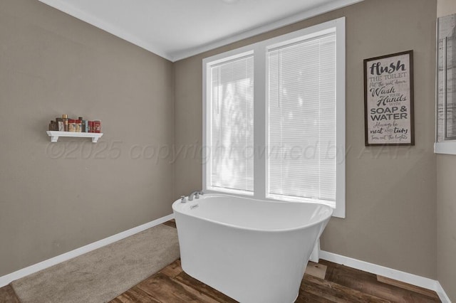 2004 Pheasant Ln, Amarillo, TX 79118 - full bath featuring a freestanding tub and wood finished floors