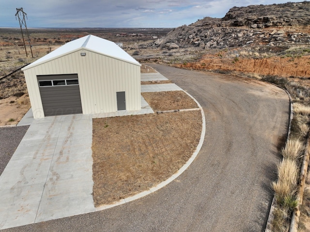 8801 Sharman Loop, Amarillo, TX 79124 - exterior space with concrete driveway and a mountain view