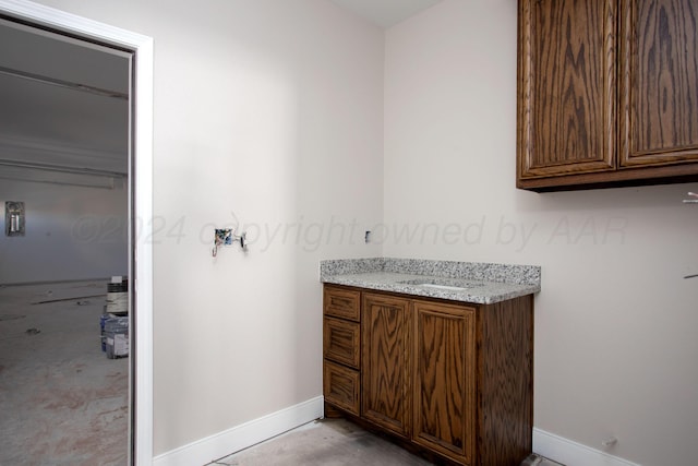 kitchen featuring light brown cabinetry