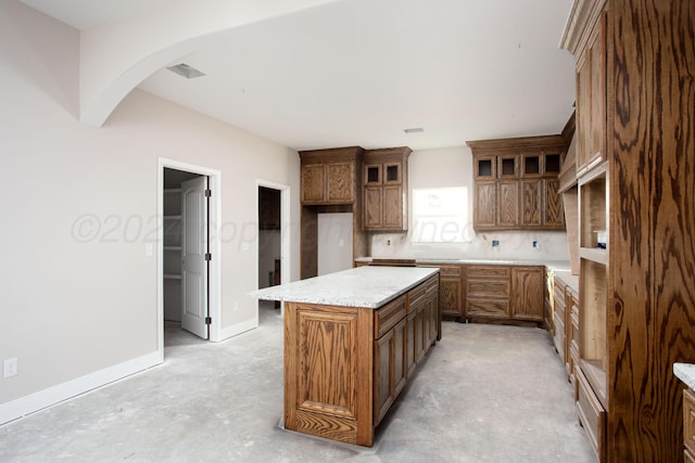 unfurnished living room with a tray ceiling