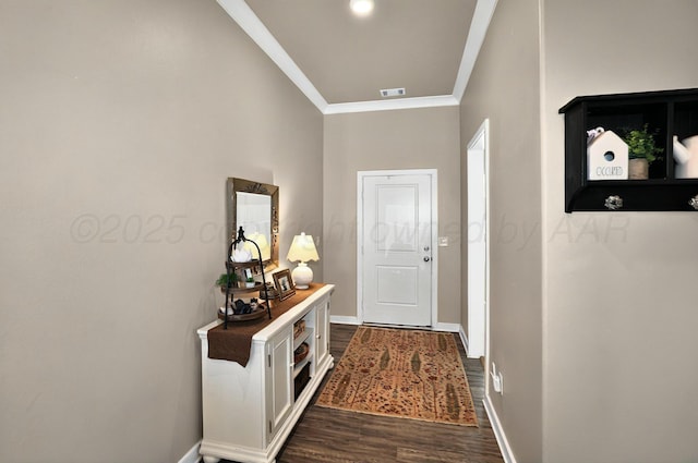 2701 Daybreak Ln, Amarillo, TX 79124 - doorway to outside featuring crown molding, dark wood-style floors, and baseboards