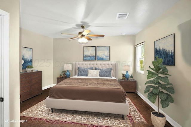 2701 Daybreak Ln, Amarillo, TX 79124 - bedroom featuring baseboards, dark wood-style floors, and ceiling fan