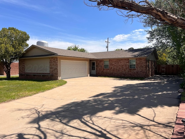 224 Beach St, Hereford, TX 79045 - single story home featuring brick siding, a garage, fence, and concrete driveway