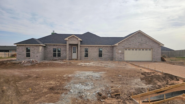 view of front of home with a garage