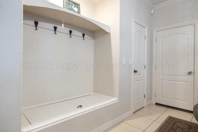 5007 Wesley Rd, Amarillo, TX 79119 - mudroom featuring light tile patterned floors and crown molding