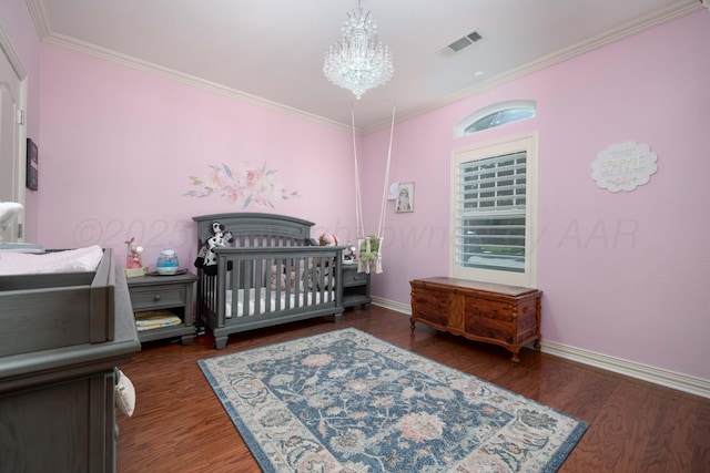 5007 Wesley Rd, Amarillo, TX 79119 - bedroom featuring a chandelier, wood finished floors, and crown molding