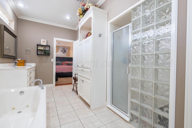 5007 Wesley Rd, Amarillo, TX 79119 - bathroom with a stall shower, tile patterned flooring, crown molding, vanity, and a jetted tub