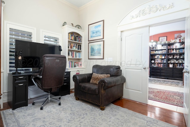 5007 Wesley Rd, Amarillo, TX 79119 - office area with wood finished floors, ornamental molding, and built in shelves