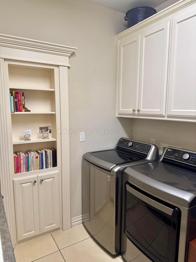 5007 Wesley Rd, Amarillo, TX 79119 - laundry area with separate washer and dryer, cabinet space, and light tile patterned floors