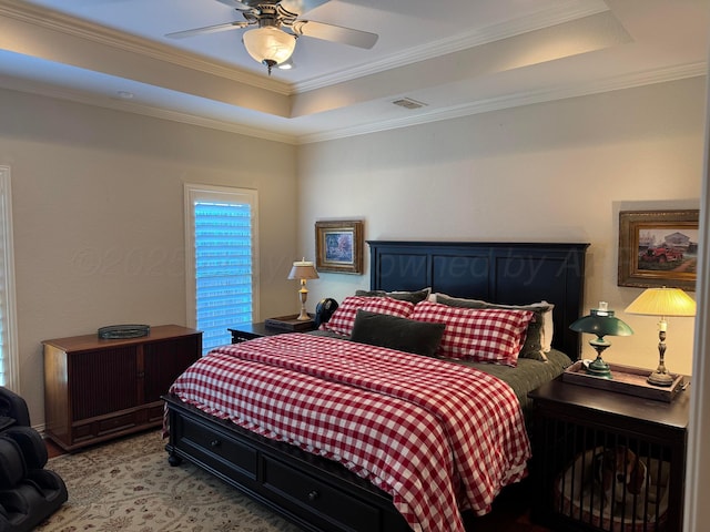 5007 Wesley Rd, Amarillo, TX 79119 - bedroom with a tray ceiling, ornamental molding, and ceiling fan