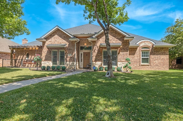 5007 Wesley Rd, Amarillo, TX 79119 - view of front facade with a pergola, brick siding, and roof with shingles