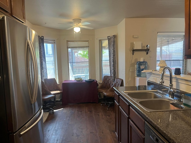 4406 S Roberts St, Amarillo, TX 79118 - kitchen with freestanding refrigerator, a sink, dark countertops, dark wood-type flooring, and ceiling fan