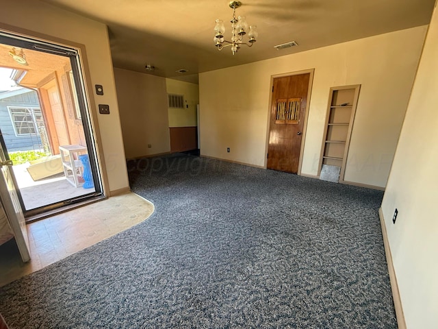 1030 Thrams St, Borger, TX 79007 - empty room with a chandelier and baseboards
