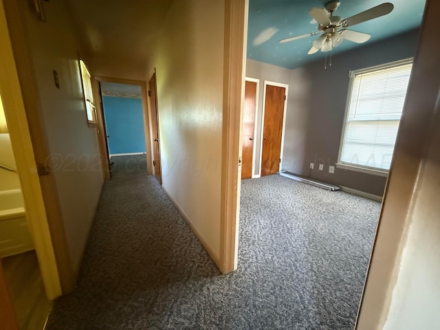 1030 Thrams St, Borger, TX 79007 - hallway with carpet flooring and baseboards