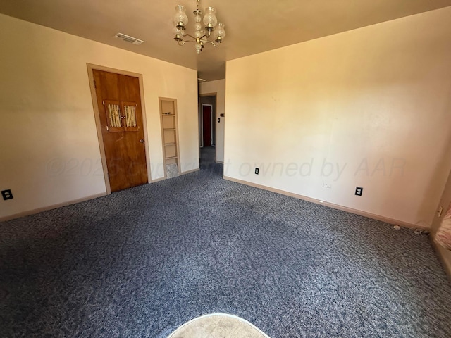 1030 Thrams St, Borger, TX 79007 - empty room featuring a chandelier, carpet, and baseboards