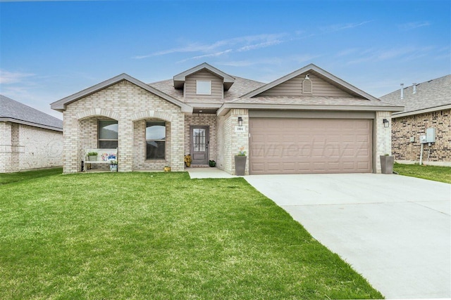 1804 Morningside Ave, Amarillo, TX 79118 - view of front of home featuring a front lawn, concrete driveway, a garage, brick siding, and roof with shingles
