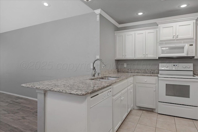 3610 S Mirror St, Amarillo, TX 79118 - kitchen with white appliances, ornamental molding, white cabinetry, a peninsula, and light stone countertops