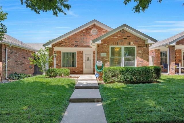 3610 S Mirror St, Amarillo, TX 79118 - traditional home featuring a front yard and brick siding