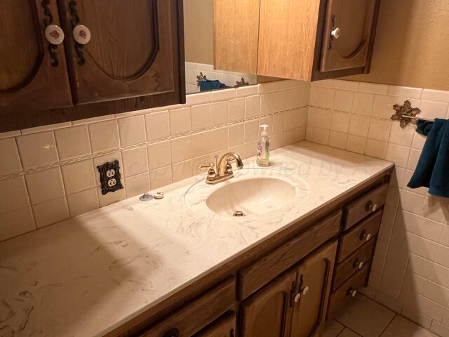 415 Mesquite Ave, Amarillo, TX 79108 - bathroom with vanity and tile walls